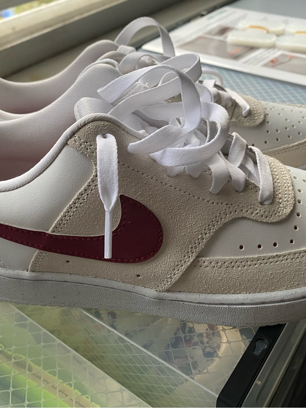 Nike Women's Low-Top Sneaker in White and Burgundy